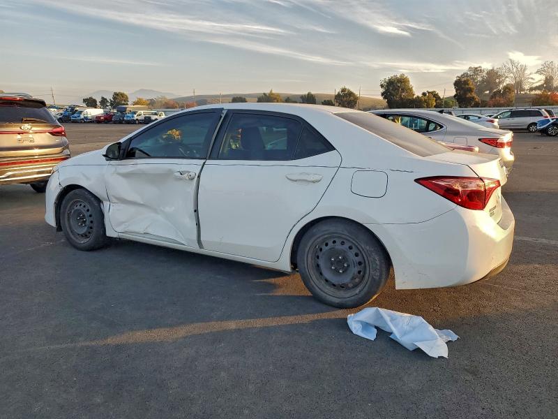 Photo 2 from auction – 2019 TOYOTA COROLLA L with VIN 5YFBURHE6KP942841