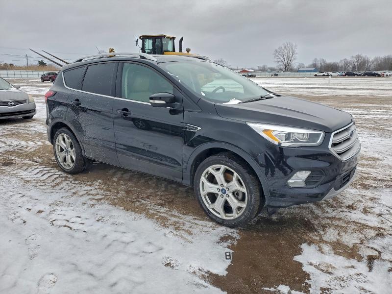 Photo 4 from auction – 2019 FORD ESCAPE TIT with VIN 1FMCU9J9XKUB98516