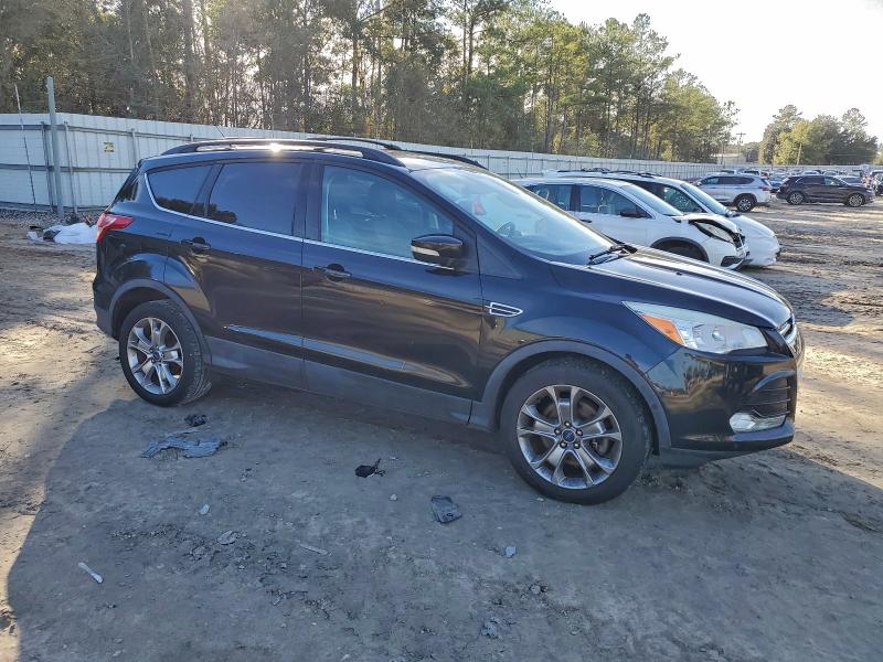 Photo 4 from auction – 2013 FORD ESCAPE with VIN 1FMCU0H90DUB60023