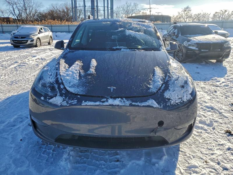 Photo 5 from auction – 2023 TESLA MODEL Y with VIN 7SAYGDED6PF949701