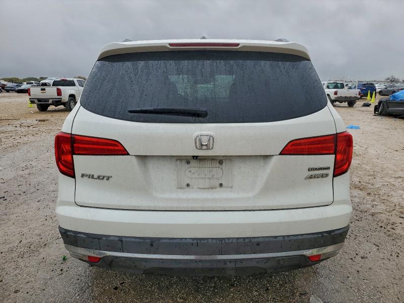 Photo 6 from auction – 2016 HONDA PILOT with VIN 5FNYF6H95GB039427