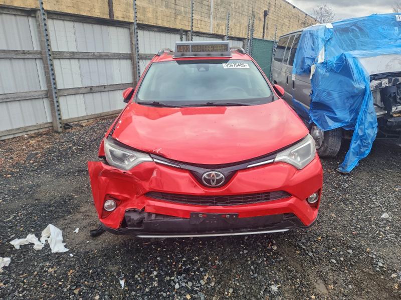 Photo 5 from auction – 2017 TOYOTA RAV4 XLE with VIN 2T3RFREV6HW663157