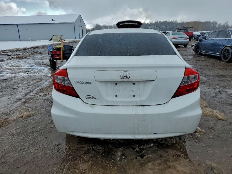 Photo 6 from auction – 2012 HONDA CIVIC LX with VIN 19XFB2F54CE381852