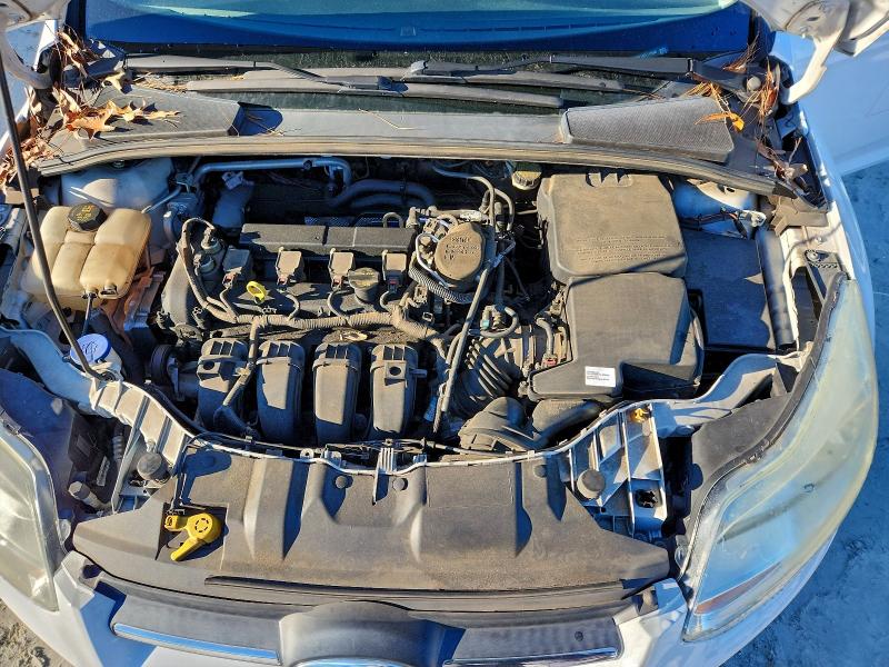 Photo 11 from auction – 2014 FORD FOCUS S with VIN 1FADP3E24EL112580