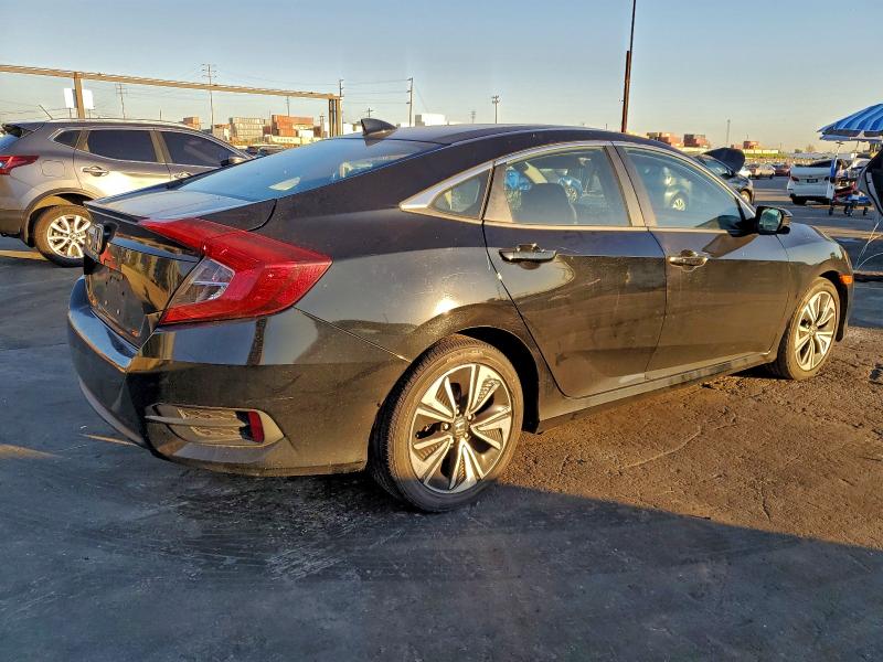 Photo 3 from auction – 2016 HONDA CIVIC EX with VIN 2HGFC1F35GH640429