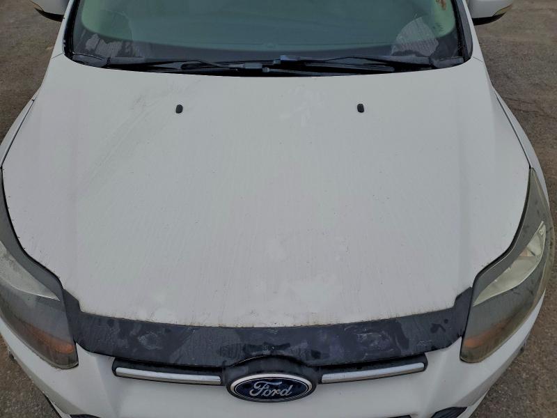 Photo 11 from auction – 2014 FORD FOCUS SE with VIN 1FADP3F27EL377833