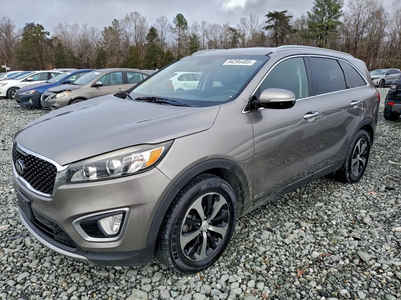 KIA SORENTO EX 2016 with VIN 5XYPHDA15GG031240 - Photo from auction
