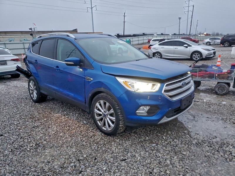 Photo 4 from auction – 2017 FORD ESCAPE TIT with VIN 1FMCU0JD6HUD08700