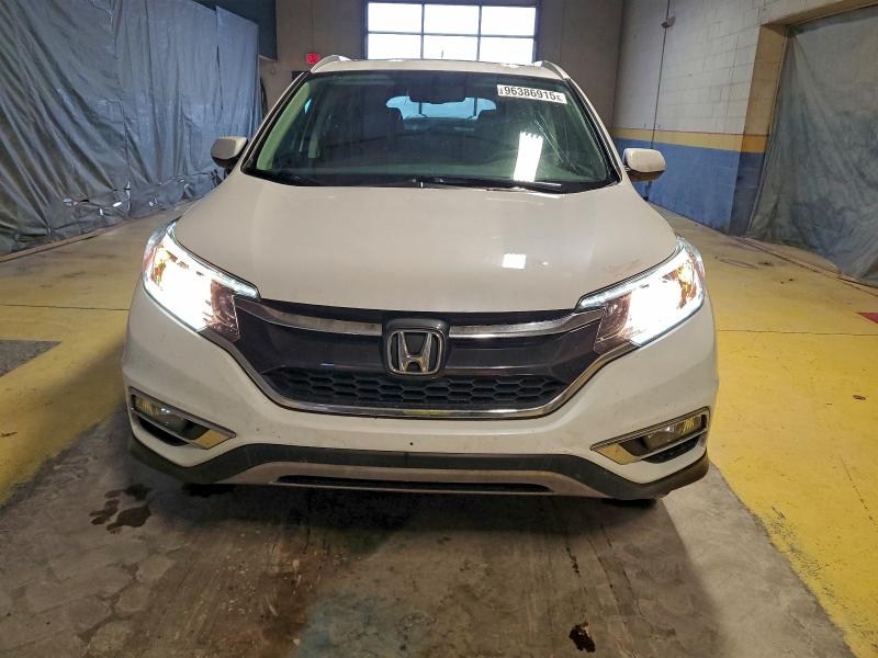 Photo 5 from auction – 2016 HONDA CR-V EXL with VIN 5J6RM4H71GL035198