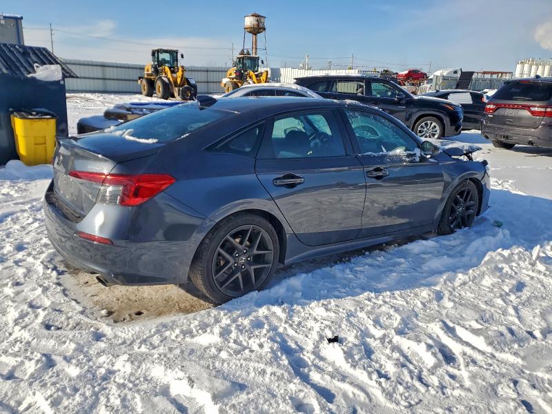 Photo 3 from auction – 2023 HONDA CIVIC SPOR with VIN 2HGFE2F51PH531449