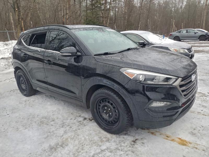 Photo 4 from auction – 2016 HYUNDAI TUCSON LIM with VIN KM8J3CA41GU061872