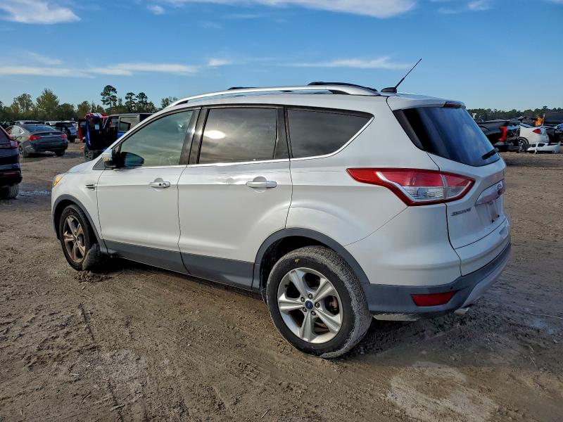 Photo 2 from auction – 2014 FORD ESCAPE TIT with VIN 1FMCU0J97EUC59532