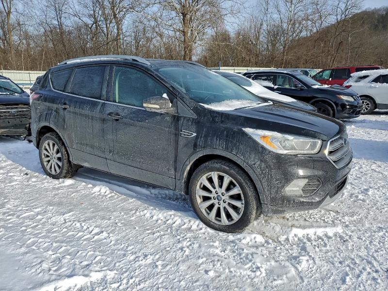 Photo 4 from auction – 2017 FORD ESCAPE TIT with VIN 1FMCU0JD8HUE32001