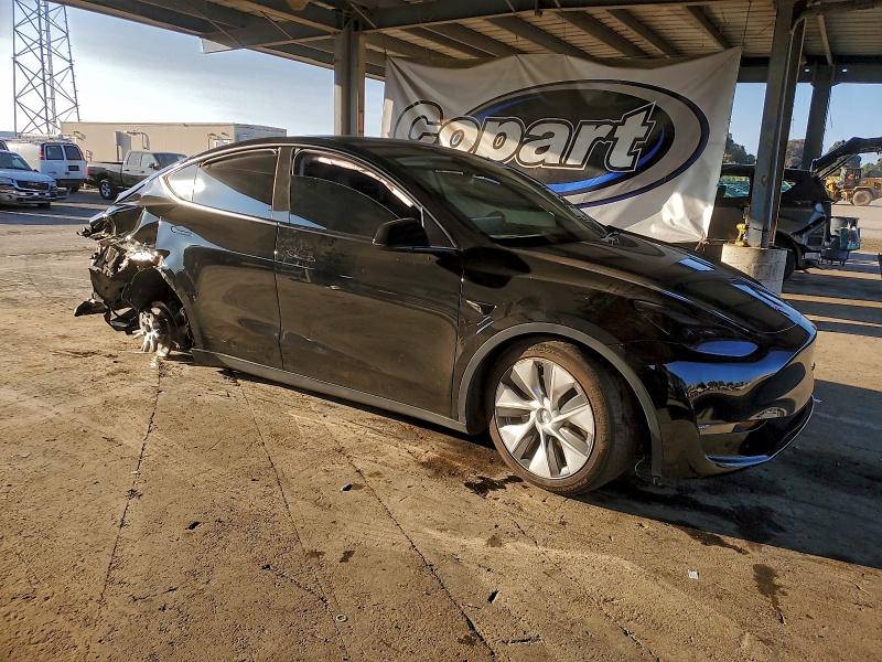 Photo 4 from auction – 2023 TESLA MODEL Y with VIN 7SAYGAEE6PF869970