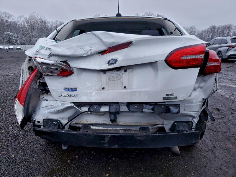 Photo 6 from auction – 2018 FORD FOCUS with VIN 1FADP3FE3JL201317