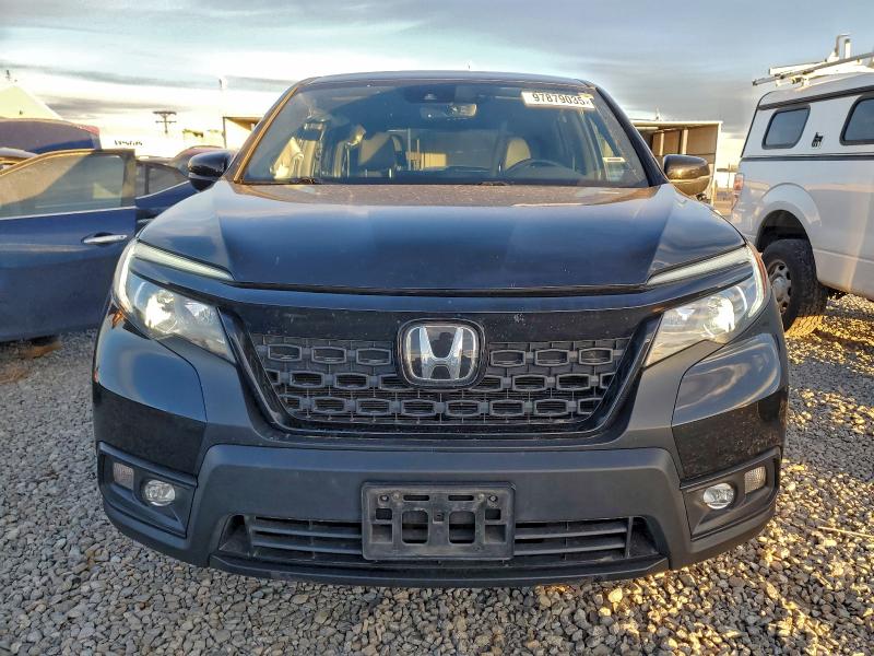 Photo 5 from auction – 2021 HONDA PASSPORT with VIN 5FNYF8H50MB025147