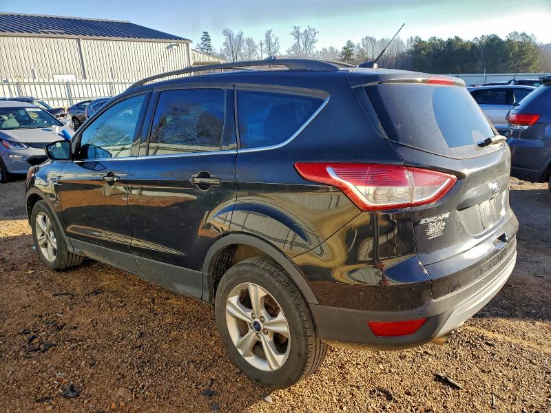 Photo 2 from auction – 2014 FORD ESCAPE SE with VIN 1FMCU0GXXEUB11221
