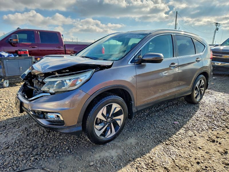Photo 1 from auction – 2015 HONDA CR-V TOURI with VIN 5J6RM4H90FL063512