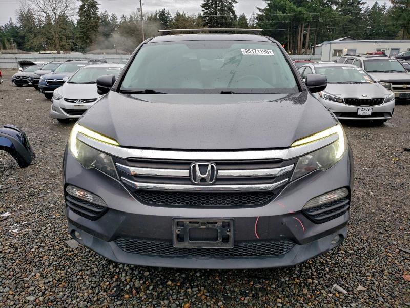 Photo 5 from auction – 2016 HONDA PILOT EXL with VIN 5FNYF5H57GB056852