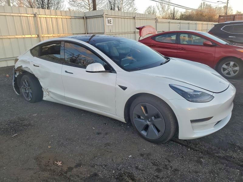 Photo 4 from auction – 2022 TESLA MODEL 3 with VIN 5YJ3E1EBXNF170096