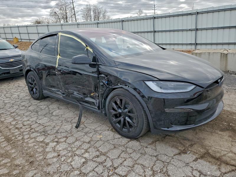 Photo 4 from auction – 2023 TESLA MODEL 3 with VIN 7SAXCBE54PF415987