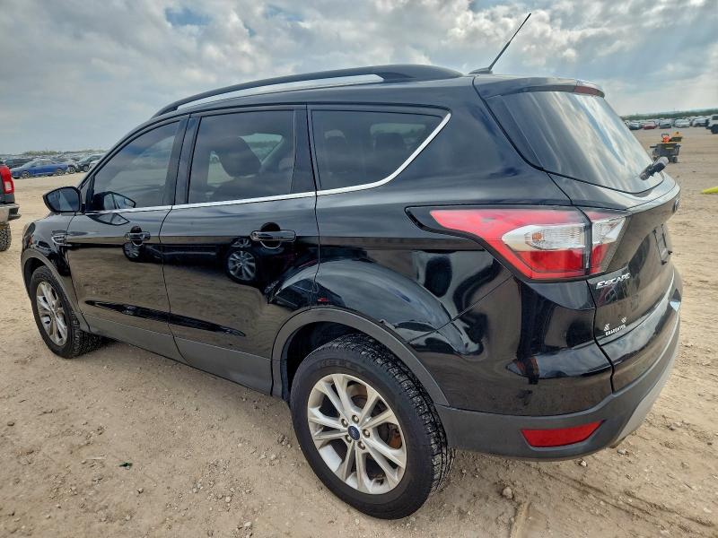 Photo 2 from auction – 2018 FORD ESCAPE with VIN 1FMCU9GD3JUC49414
