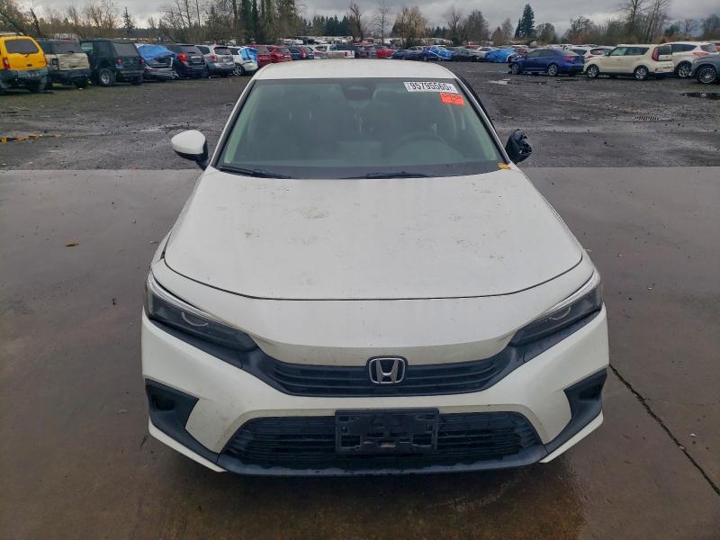 Photo 5 from auction – 2023 HONDA CIVIC LX with VIN 2HGFE2F26PH538970