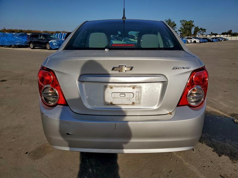 Photo 6 from auction – 2013 CHEVROLET SONIC LS with VIN 1G1JA5SH8D4128575