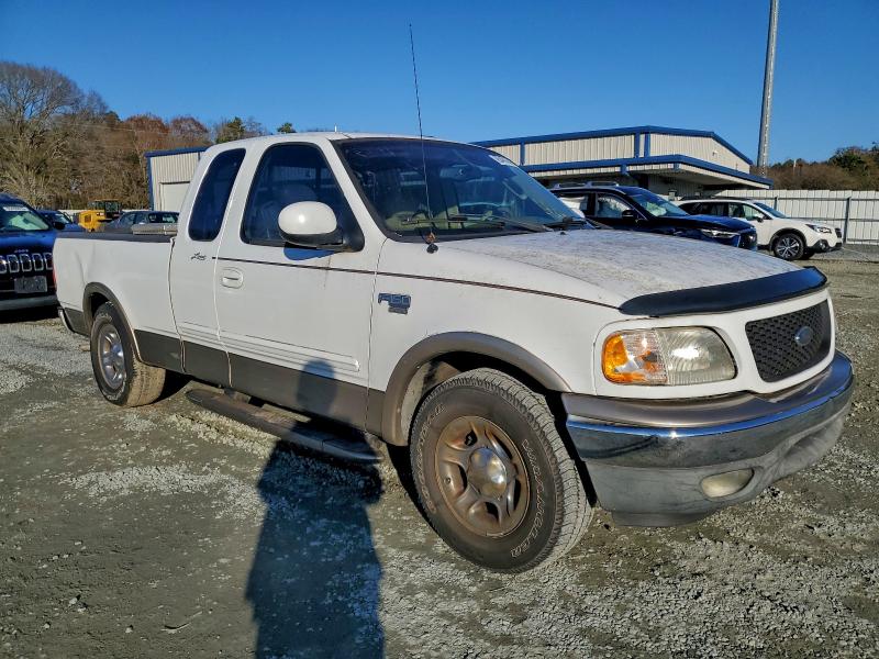 Photo 4 from auction – 2003 FORD F150 with VIN 1FTRX17W23NA43961