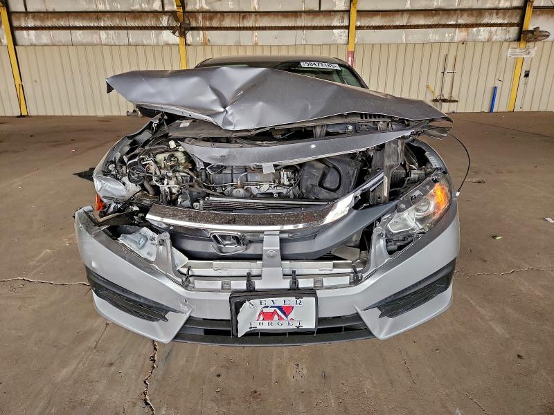 Photo 5 from auction – 2018 HONDA CIVIC LX with VIN 2HGFC2F54JH588015