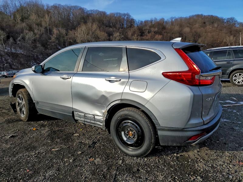 Photo 2 from auction – 2018 HONDA CR-V with VIN 7FARW2H54JE075020