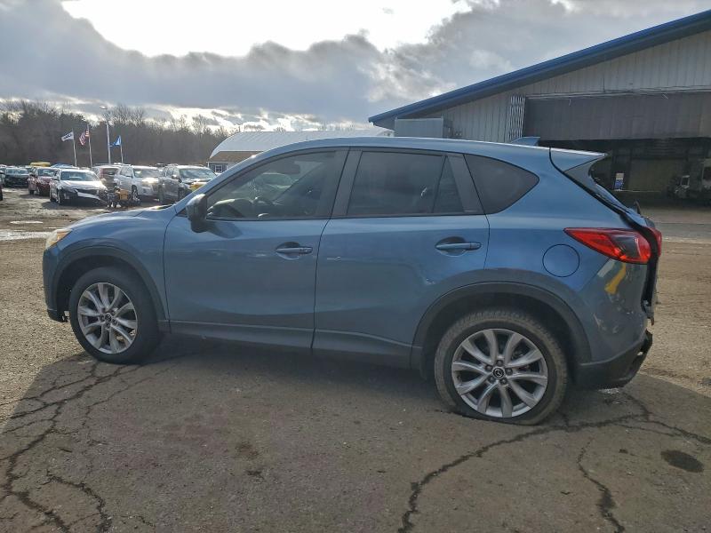 Photo 2 from auction – 2014 MAZDA CX-5 GT with VIN JM3KE4DYXE0415973