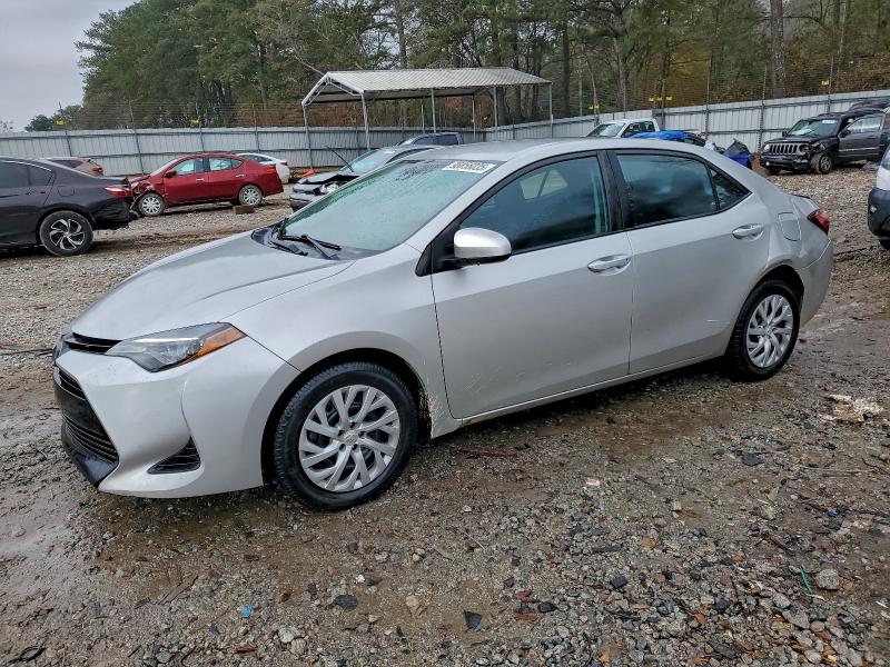 TOYOTA COROLLA L 2019 with VIN 5YFBURHE1KP875131 - Photo from auction