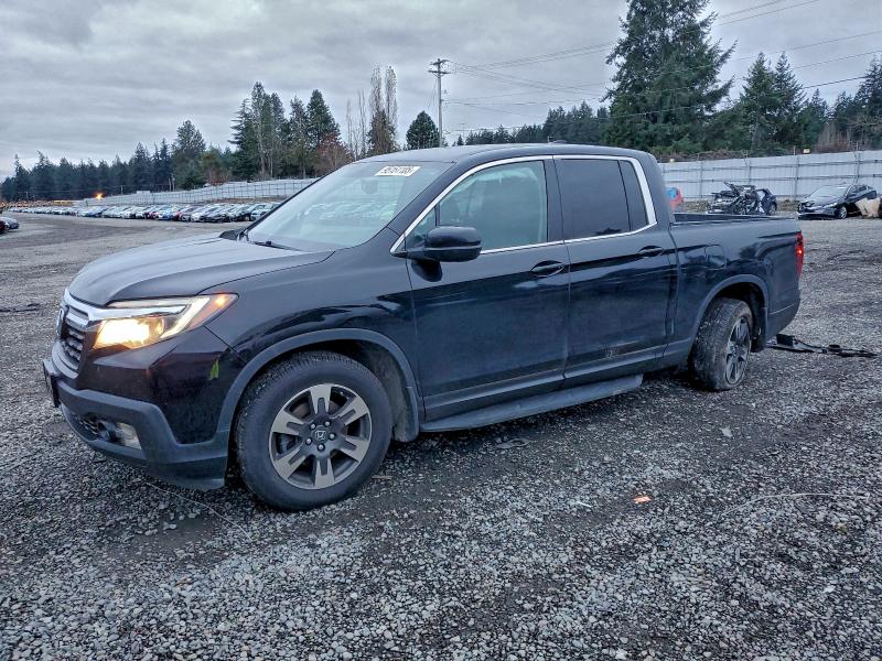 HONDA RIDGELINE 2017 with VIN 5FPYK3F61HB004086 - Photo from auction