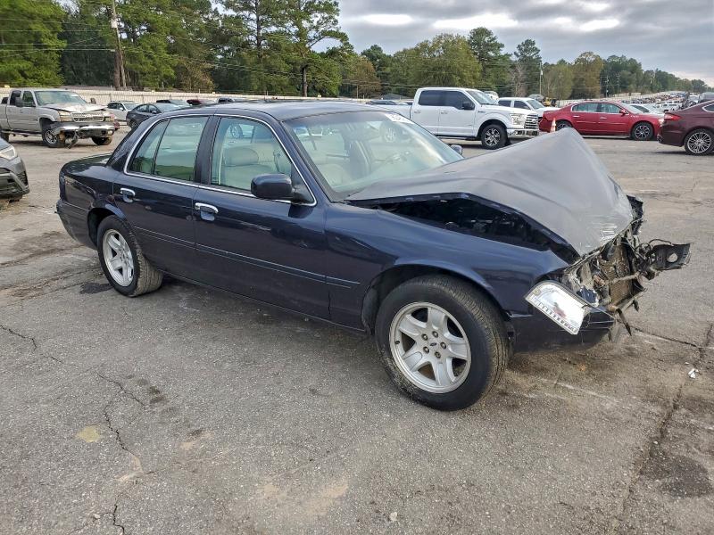 Photo 4 from auction – 2002 FORD CROWN VICT with VIN 2FAFP74W32X146450