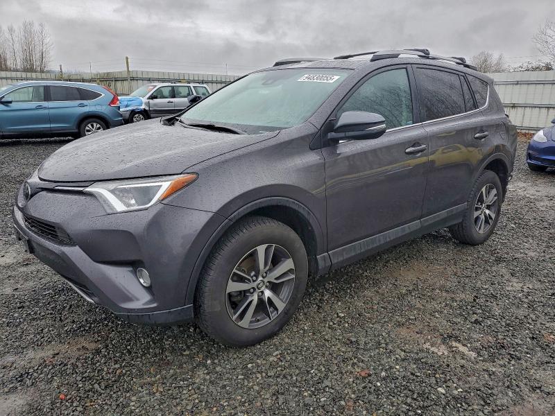 TOYOTA RAV4 XLE 2017 with VIN 2T3RFREV7HW599081 - Photo from auction