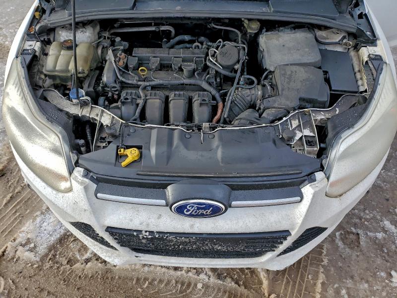 Photo 11 from auction – 2013 FORD FOCUS SE with VIN 1FADP3F23DL273483