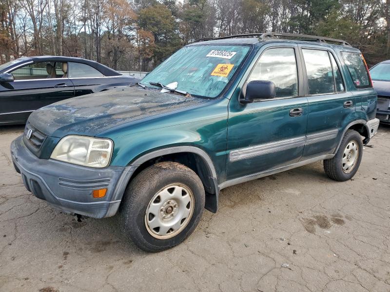 HONDA CR-V LX 2001 with VIN JHLRD28431S005524 - Photo from auction