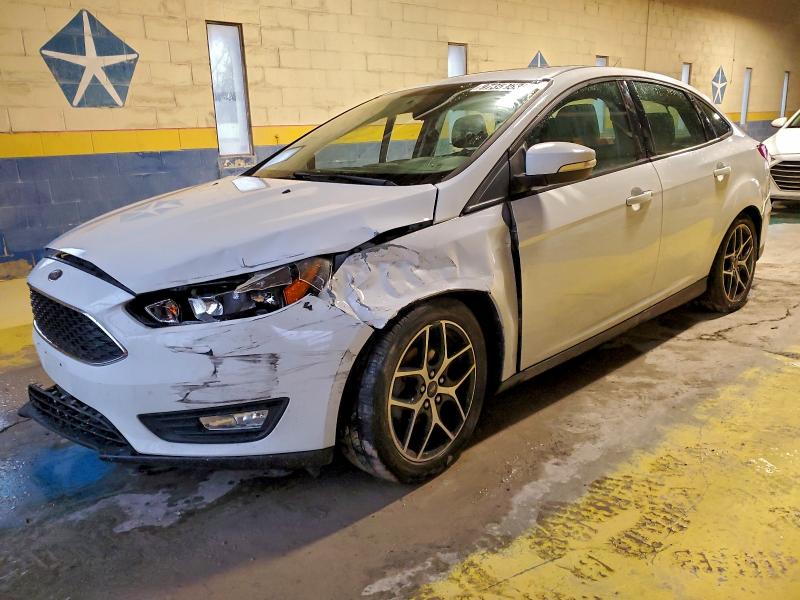 FORD FOCUS 2018 with VIN 1FADP3H24JL285599 - Photo from auction