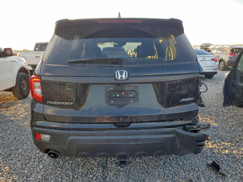 Photo 6 from auction – 2021 HONDA PASSPORT with VIN 5FNYF8H50MB025147