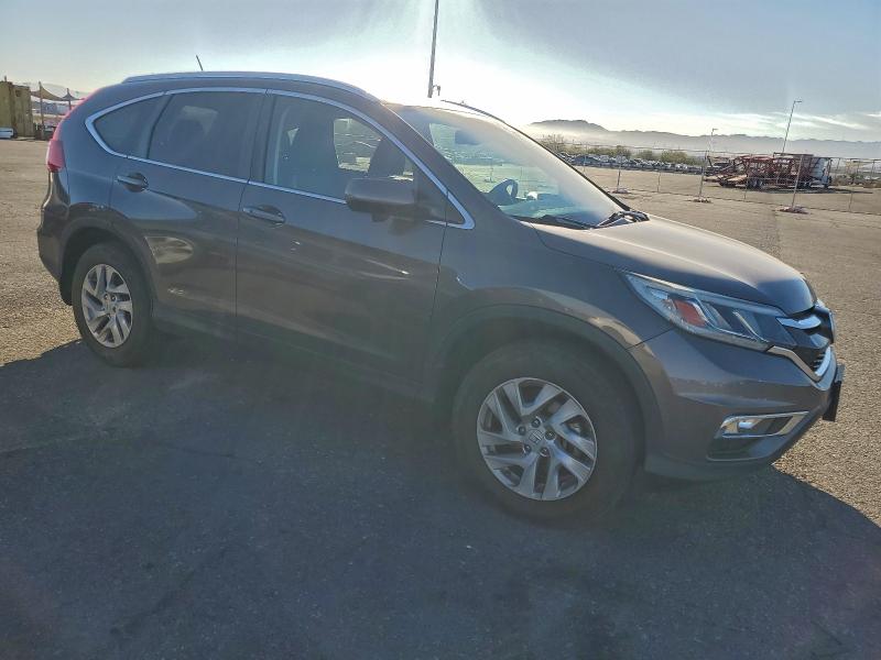 Photo 4 from auction – 2015 HONDA CR-V EXL with VIN 2HKRM4H73FH678905