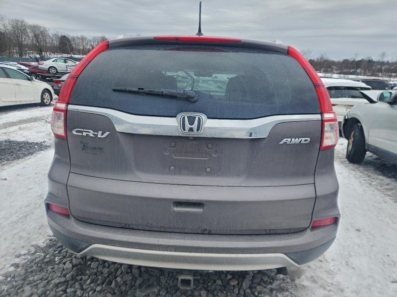 Photo 6 from auction – 2015 HONDA CR-V EXL with VIN 2HKRM4H74FH686334