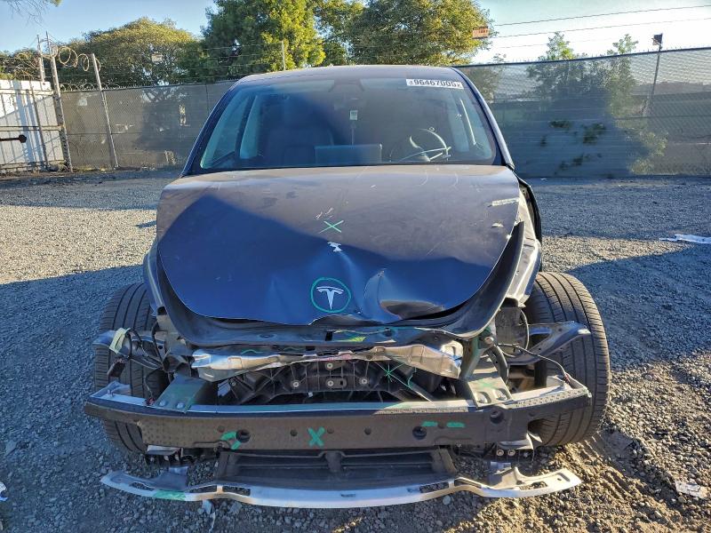 Photo 5 from auction – 2022 TESLA MODEL Y with VIN 7SAYGDEE9NF343301