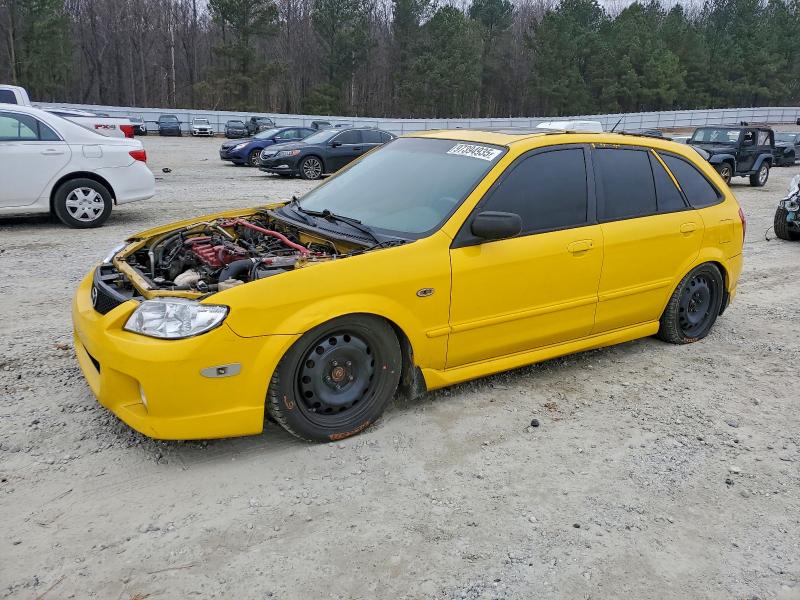 MAZDA PROTEGE PR 2003 with VIN JM1BJ245031100752 - Photo from auction