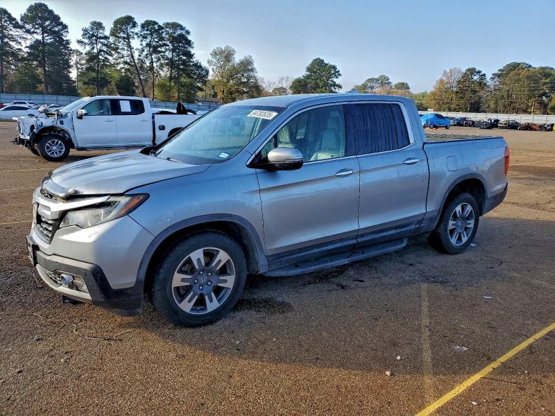 HONDA RIDGELINE 2017 with VIN 5FPYK3F77HB024674 - Photo from auction