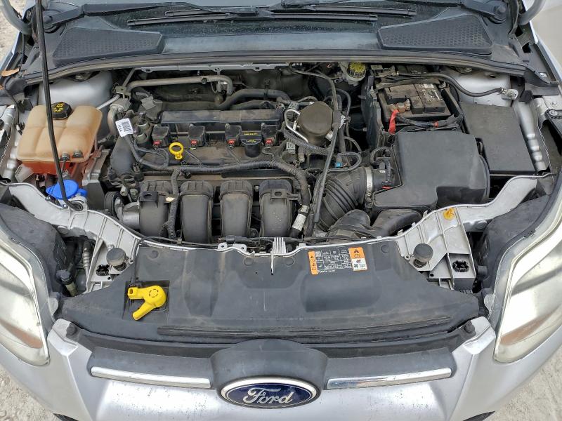 Photo 11 from auction – 2014 FORD FOCUS SE with VIN 1FADP3F23EL325938
