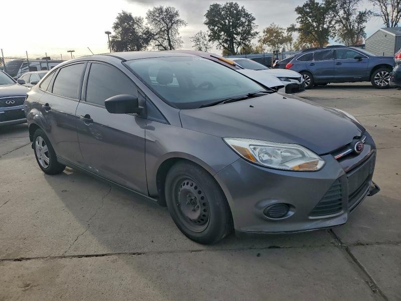 Photo 4 from auction – 2013 FORD FOCUS S with VIN 1FADP3E27DL116556