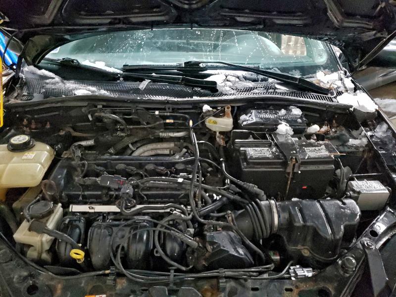 Photo 11 from auction – 2007 FORD FOCUS with VIN 1FAHP31N07W205955