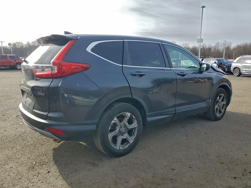 Photo 3 from auction – 2017 HONDA CR-V EX with VIN 2HKRW2H50HH649944