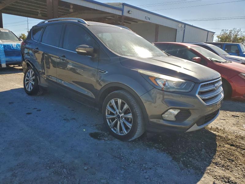 Photo 4 from auction – 2017 FORD ESCAPE TIT with VIN 1FMCU0J95HUD04830